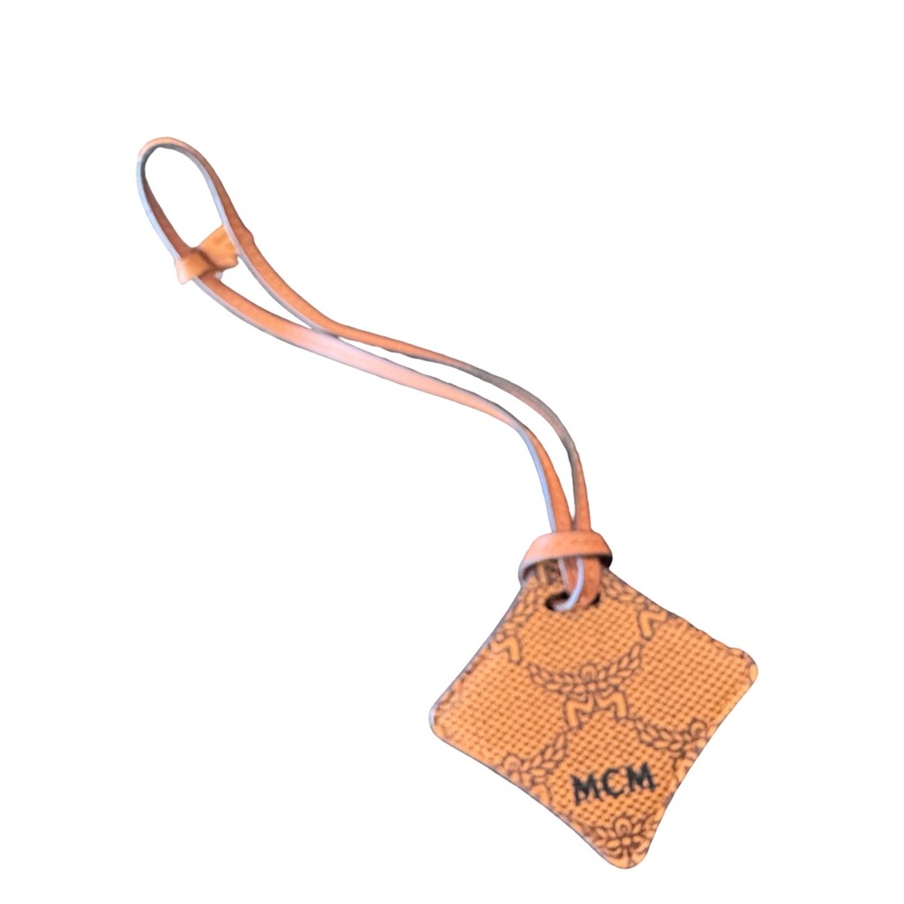 MCM leather air tag holder/ with leather strap, box and Dustbag
